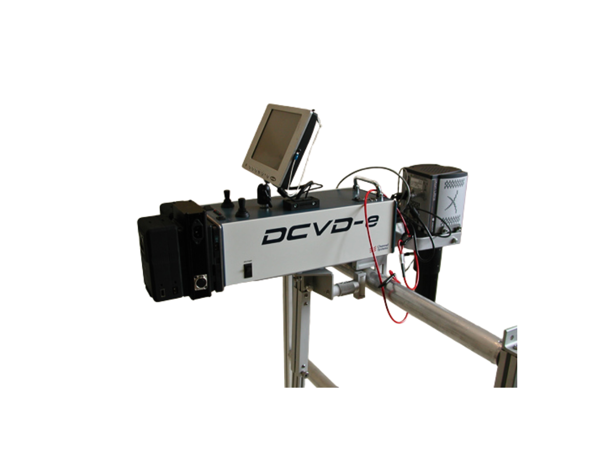 DCVD system with camera and UV zoom lens mounted on a railing 