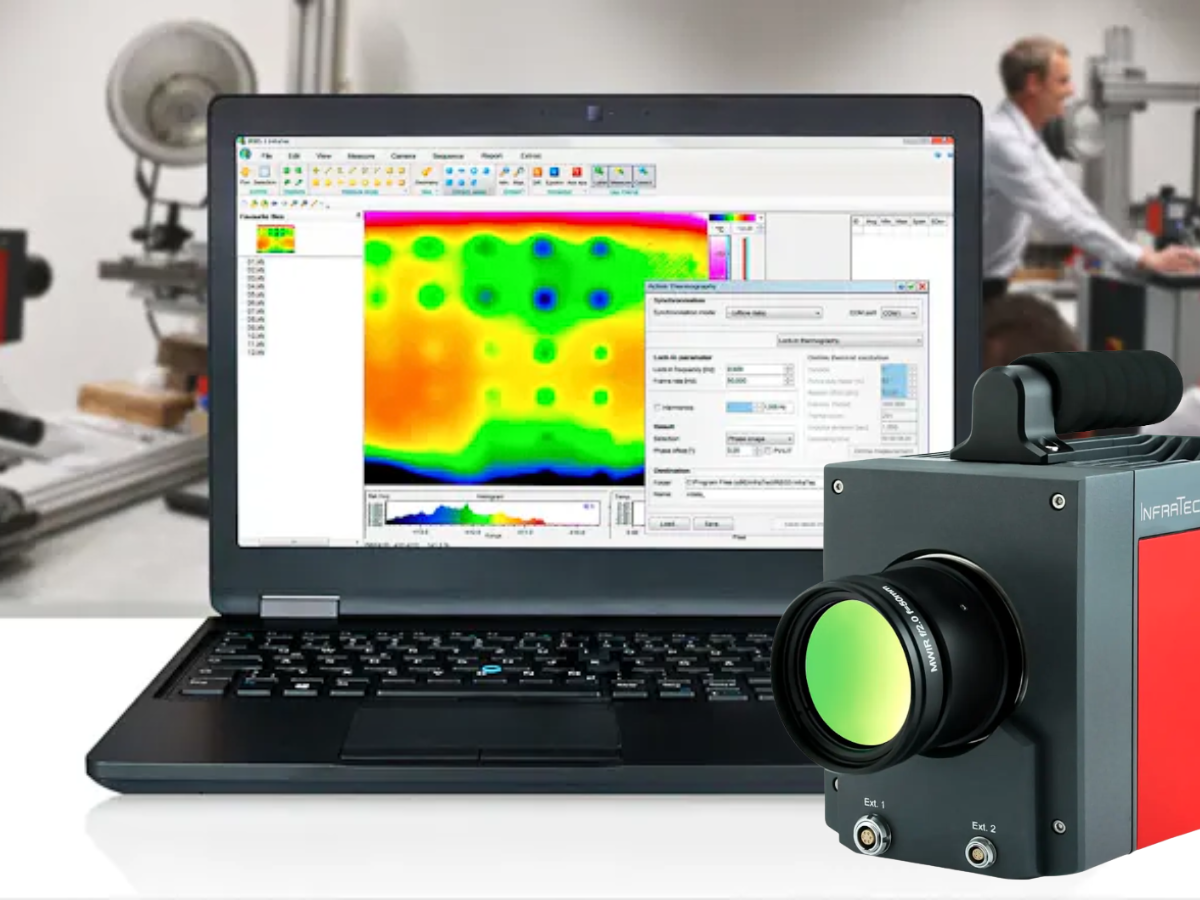ImageIR camera beside laptop showing thermographic software and people in the background using the equipment
