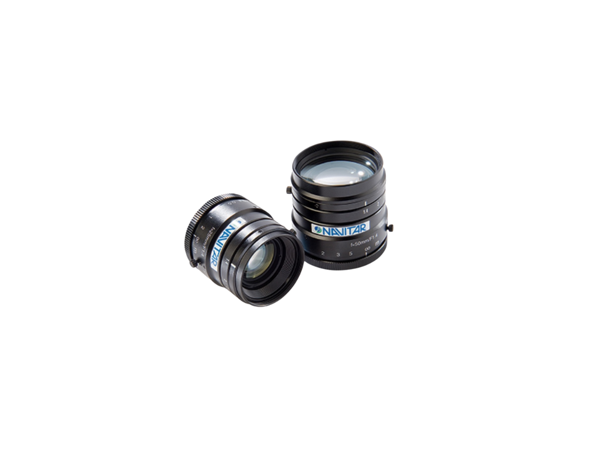 Two Navitar SWIR lenses, one sitting upright and one on it's side